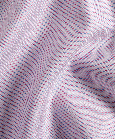 Close-up of David Donahue TBSP10013 fabric by David Donahue, featuring light pink and purple geometric dots, visible folds, and a subtle herringbone weave reminiscent of premium dress shirts.