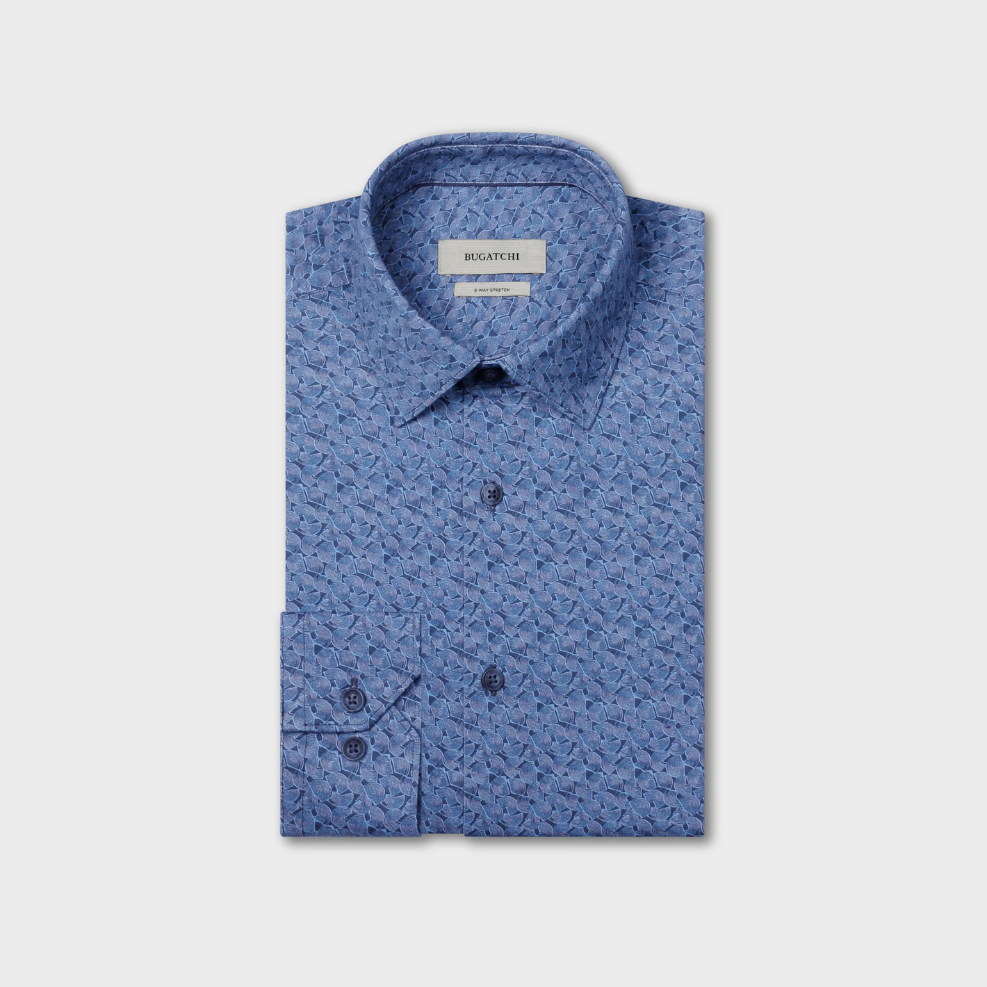A folded blue Bugatchi James Geometric Sport Shirt (KF9188K60) with a subtle geometric pattern, designed with a button-down collar and cuffs, is displayed on a plain light background. This wrinkle-resistant shirt by Bugatchi combines sophisticated style with lasting comfort.