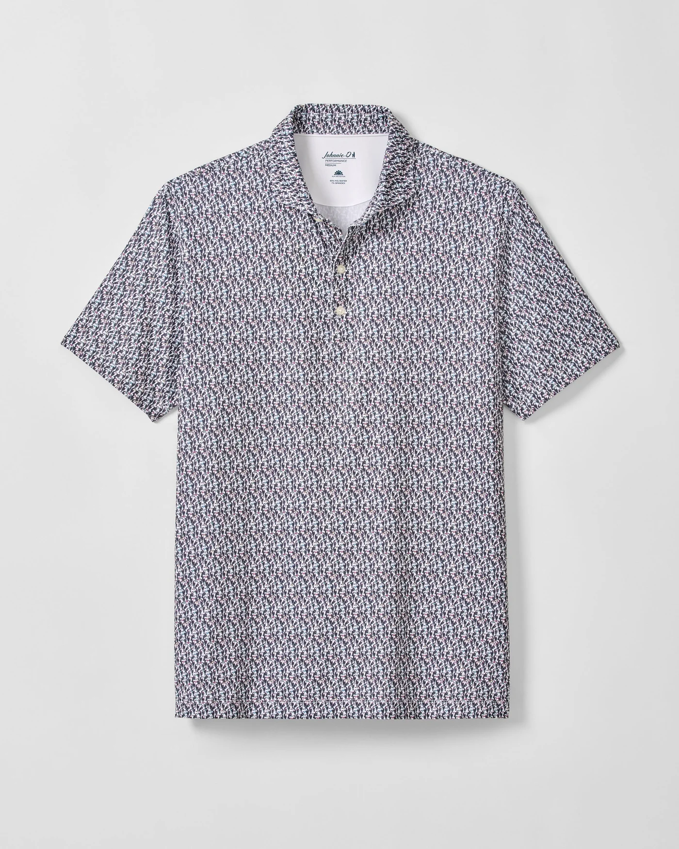 The Johnnie-O Toco Performance Jersey Polo by Johnnie-O features short sleeves, a collar, and a small geometric pattern in blue, red, and white, shown laid flat on a white background.