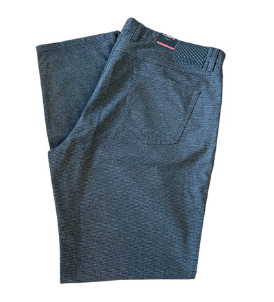 A pair of Alberto Stone Mini Check Smart Wool Pants 1625, folded to show blue textured fabric, back pocket, belt loops, and the Alberto label; their wrinkle-resistant wool adds extra polish.