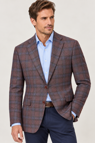 A man wearing a Hart Schaffner Marx New York Burgundy Plaid Sport Coat 35H0128 over a light blue button-down shirt and dark trousers.