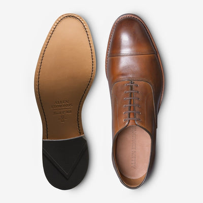 A pair of Allen Edmonds Park Avenue brown premium European calfskin oxford dress shoes, shown top and bottom on a white background. The sole features the Allen Edmonds brand.