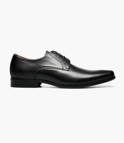 The Florsheim Postino Plain Ox Black Smooth by Florsheim is a black leather lace-up dress shoe with a cap toe oxford design, low heel, and slightly pointed toe, shown side view on a white background.