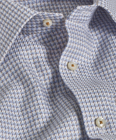 Close-up of the David Donahue Chk TBSP10809464 shirt by David Donahue, made from Pima cotton with a blue and brown geometric grid pattern, spread collar, white buttons, and barrel cuffs.