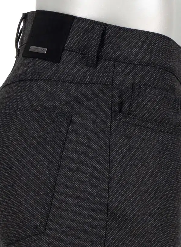 Close-up side view of the Alberto Pipe Melange Birdseye Pant 1638, featuring dark textured melange wool, belt loops, a back pocket, and a small metal Alberto brand tag near the waistband.