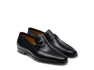The Magnanni Silvano by Magnanni: black leather monk strap loafers with low heels, shown on a white background—a comfortable and stylish dress shoe for the modern wardrobe.
