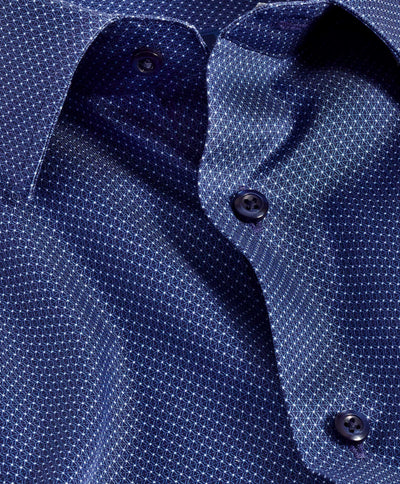 Close-up of the David Donahue Textured Dot Shirt TBSP11006 in blue, featuring a subtle navy dot pattern and dark buttons. Made from soft Pima cotton, it appears partially unbuttoned and slightly wrinkled.