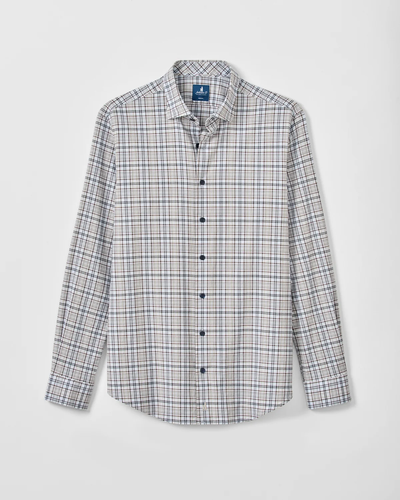 A classic men’s flannel shirt, the Johnnie-O Tahoe Plaid Flannel Shirt Big & Tall features a white base with a blue and red plaid pattern and long sleeves, shown against a plain white background. This timeless style is crafted by Johnnie-O.