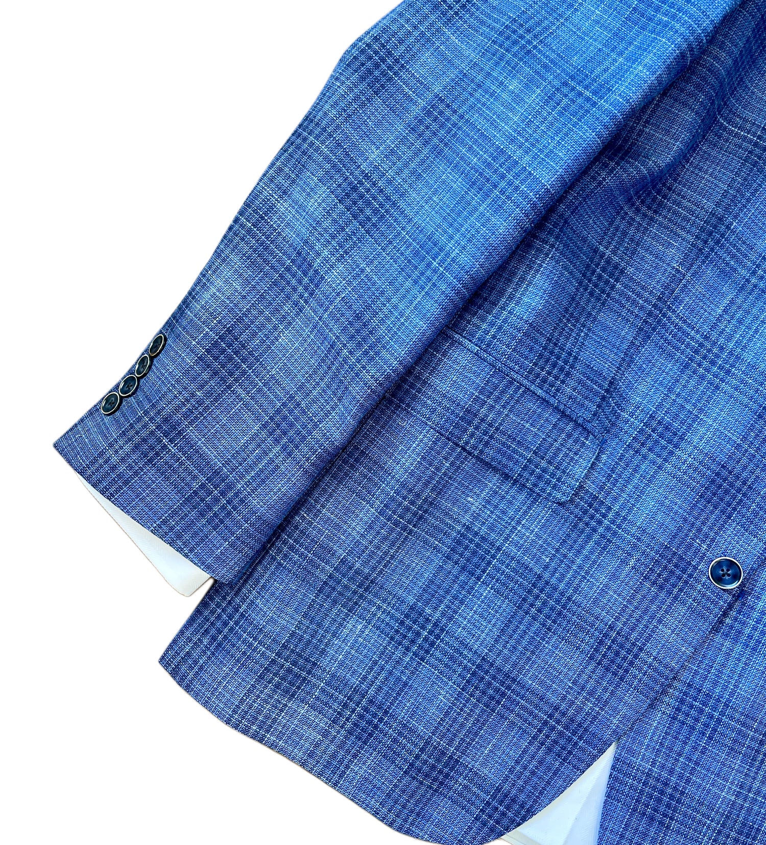 The TailoRed Gianni Sport Coat 8130534 is a blue plaid men's blazer with a front pocket and three dark sleeve buttons, shown on a white background.