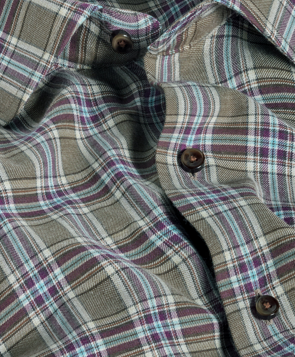 Close-up of the David Donahue Plaid Cotton Shirt (style CMSW13828), crafted from Pima cotton with a plaid pattern in beige, green, teal, and purple hues, highlighting three dark buttons and soft fabric folds.