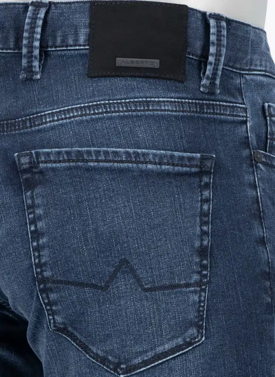 Close-up of the back pocket and waistband area of Alberto Stone 1984 Str Denim Big & Tall blue jeans, featuring a black Alberto label on the Cotton T400 waistband.