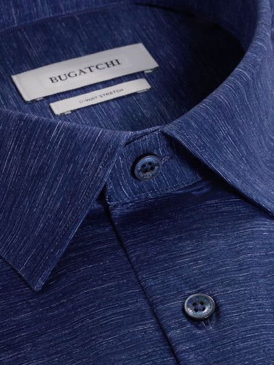 Close-up of the Bugatchi James Long Sleeve Shirt HF9505K60 in blue, crafted from Italian fabric, featuring collar, buttons, and a label with Bugatchi and O-WAY STRETCH—ideal for premium menswear enthusiasts.