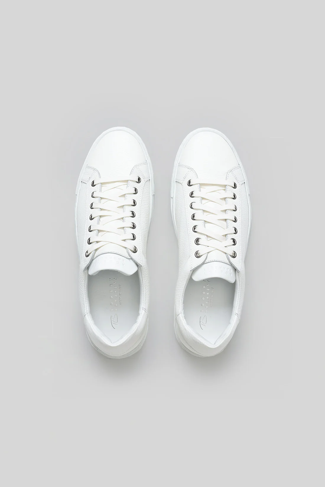 A pair of Robert Barakett Terrence Leather Sneakers by Robert Barakett, crafted from premium Italian calfskin, are displayed side by side on a light gray background in a top-down view.