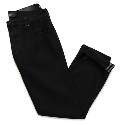 The 34 Heritage Courage Black Urban Jeans by 34 Heritage are neatly folded, highlighting the visible waistband and cuffs, and featuring a classic straight leg fit.