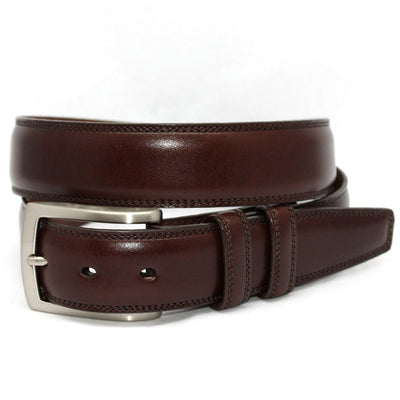 The Torino Belt Smooth by Torino is a classic brown Italian leather belt with a silver buckle, coiled and displayed on a white background.