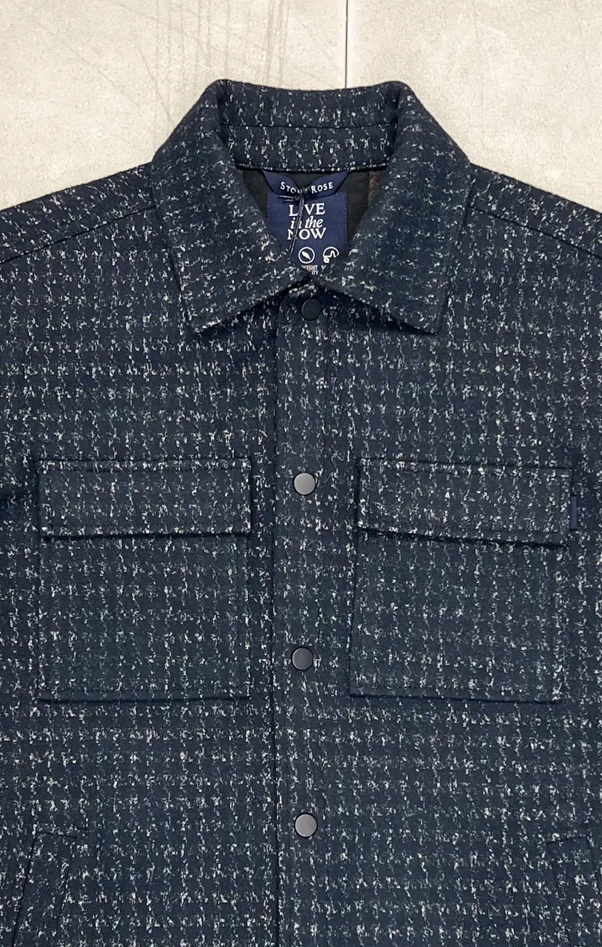Stone Rose Hunter Knit Houndstooth Jacket in dark navy and white, featuring a button-up front, two chest pockets, and a spread collar.