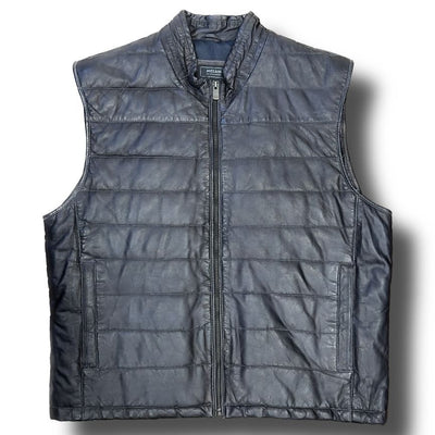 The Missani Leather Vest by Missani is a black, sleeveless vest made from Italian lambskin leather with a quilted design, front zipper, and two side pockets, shown on a white background.