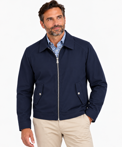Man wearing a Hart Schaffner Marx Felix Commuter Jacket 6214 over a patterned shirt and beige pants, standing against a plain white background.