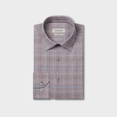 Folded Bugatchi James Plaid Sport Shirt (style KF9278K60) by Bugatchi, featuring long sleeves and buttoned cuffs in a brown, blue, and white geometric plaid print, displayed on a white background; this wrinkle-resistant dress shirt combines all-day crispness with contemporary style.
