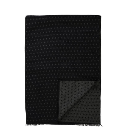 The Amanda Christensen Double Face Dot Scarf 440614 features a sleek black rectangular design with a subtle dot pattern, shown flat with a folded corner revealing the reverse. An elegant scarf from Amanda Christensen, ideal for any occasion.