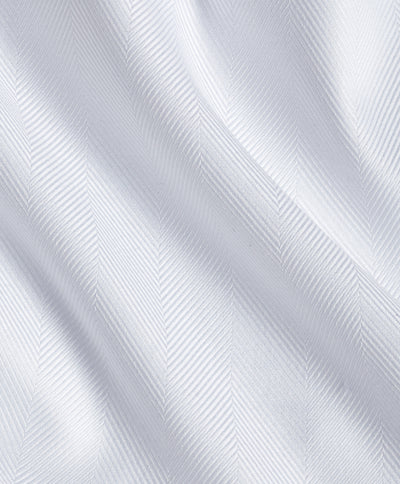 Close-up of David Donahue Contrast Herringbone Solid Dress Shirt TBMS13100 fabric showing a subtle herringbone pattern, soft sheen, gentle folds, and texture.