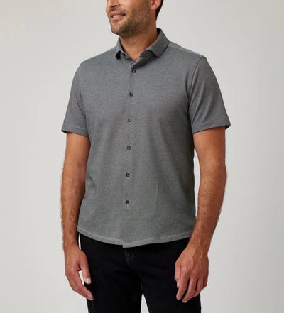 A man wears the Stone Rose SS Pique Shirt 2K7T241 and black pants, standing against a plain light background.