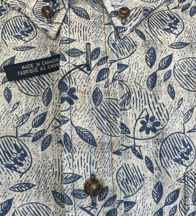 Close-up of the Viyella Floral Sport Shirt 654465 Big & Tall, featuring a blue and white pattern, brown buttons, and a "Made in Canada / Fabriqué au Canada" tag.