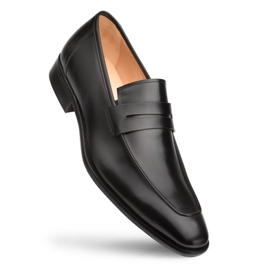 The Mezlan Calfskin Penny Loafer E20243 by Mezlan is a black leather loafer for men, featuring a low heel, rounded toe, and classic penny strap detail. Displayed at an angle on a white background, these handcrafted shoes are made from the finest calfskin leather for timeless style and comfort.