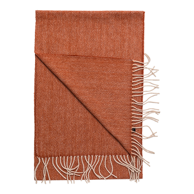 The Amanda Christensen Herringbone Scarf 44017 features a rust-colored herringbone pattern with cream fringe, ideal as a men's accessory or inspiration for classic wool scarves.