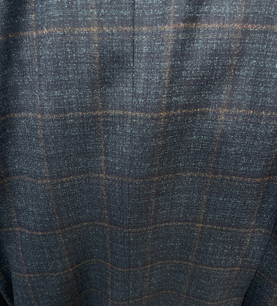 Close-up of dark Super 110’s Italian wool fabric with a subtle brown and blue plaid, featured in the Jack Victor Sport Coat 1252209 by Jack Victor.