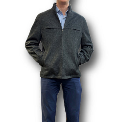 A man wearing the Enzo Coat Play by Enzo—a textured dark coat over a light blue collared shirt and navy pants—stands against a white background.