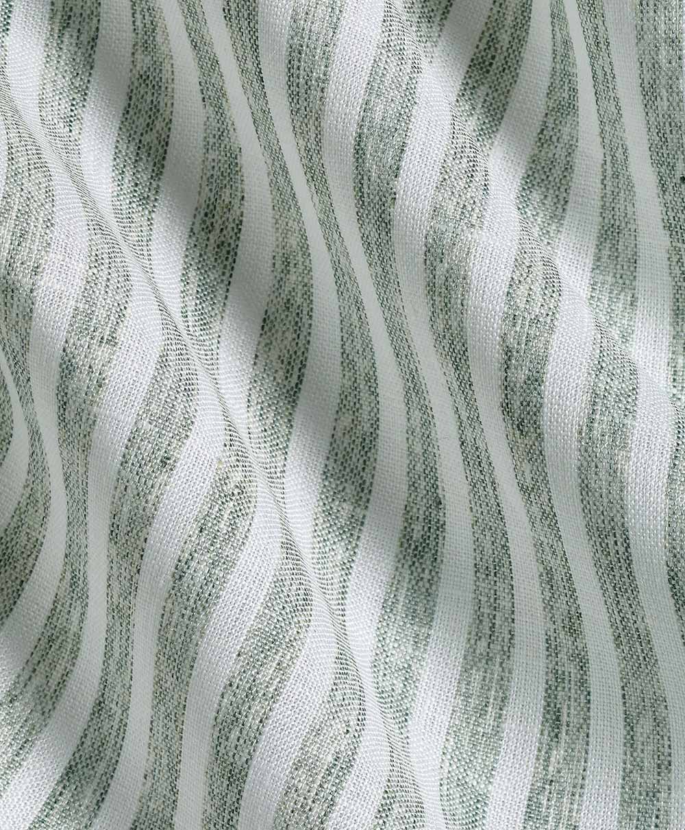 Close-up of the David Donahue Linen Stripe Sport Shirt, featuring gray-green wavy vertical stripes on sage and white, gently folded textured fabric.