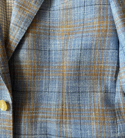 Close-up of the Paul Betenly Kevin Sport Coat Brown/Blue 2K5165, showing its textured plaid fabric and a light-colored button in the lower left corner.