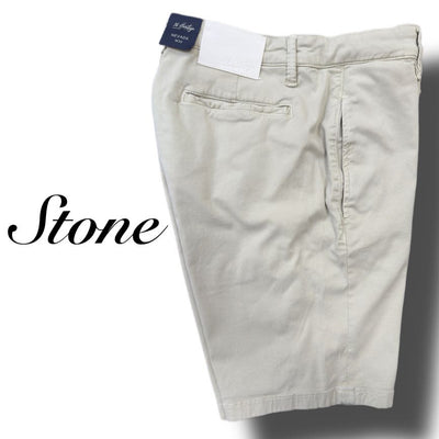 A pair of 34 Heritage Nevada Soft Touch Shorts in light beige, featuring comfort rise, a visible back pocket, and a brand tag on the waistband.