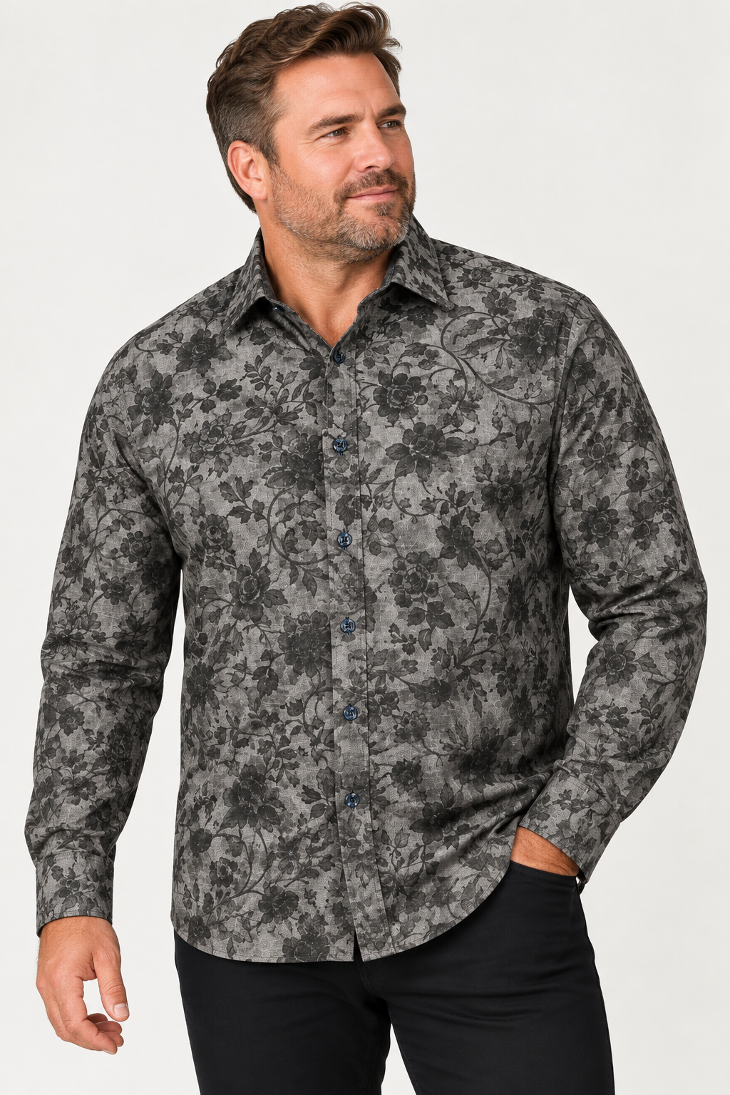 Man wearing the 7 Downie St. Floral Long Sleeve Sport Shirt Big & Tall, standing with one hand in his pocket and looking slightly to the side.