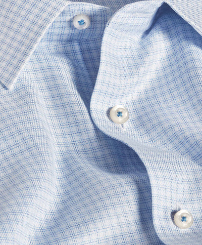 Close-up of the David Donahue OP White & Blue Check Dress Shirt (TBSP12816135), featuring a trim fit collar, buttons, and textured fabric in a subtle check pattern for a refined look.