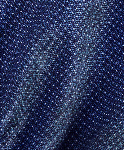 Close-up of dark blue Pima cotton fabric from the David Donahue Textured Dot Shirt (TBSP11006), featuring a geometric pattern of small, intersecting lines that form diamonds and grids for a textured look.