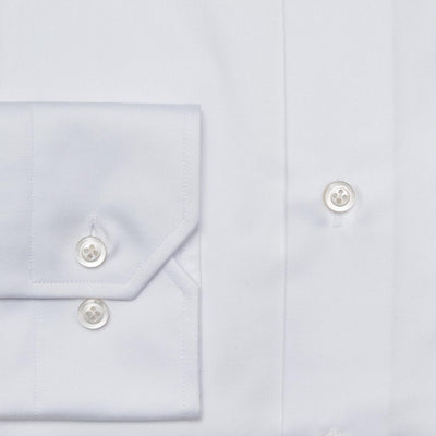 Close-up of the Hagen Twill Dress Shirt MB1862100 by Hagen, crafted from premium cotton twill, featuring a view of the sleeve with two buttons and part of the front with two additional buttons—an essential addition to any formal wardrobe.
