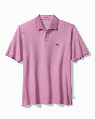 The Tommy Bahama Emfielder Island Zone Polo Big & Tall is a short-sleeve, light purple Supima cotton shirt with a collar, three buttons, moisture-wicking fabric, and a small blue logo embroidered on the left chest.