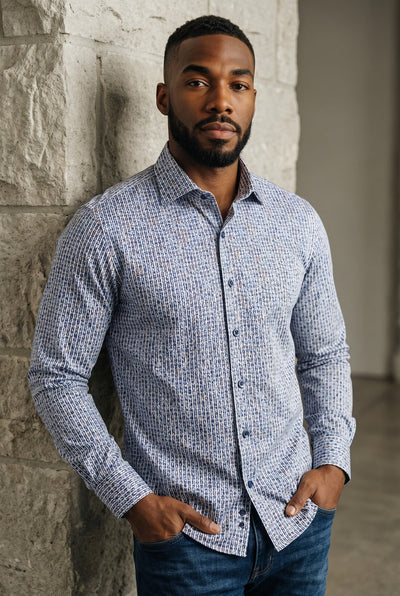 A man wearing a Marcello Dali Vertical Ovals Sport Shirt W228 with a blue and white vertical oval pattern and blue jeans.