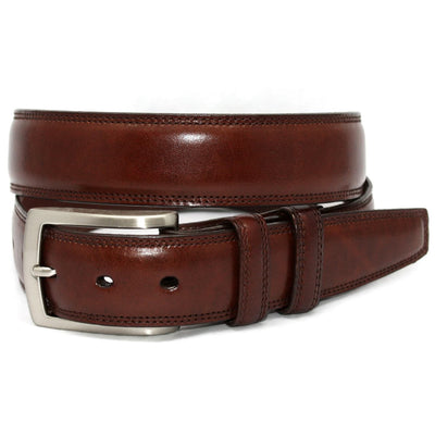 The Torino Italian Burnished Kipskin Leather Belt by Torino features rich brown leather and a silver buckle, coiled in a loop.
