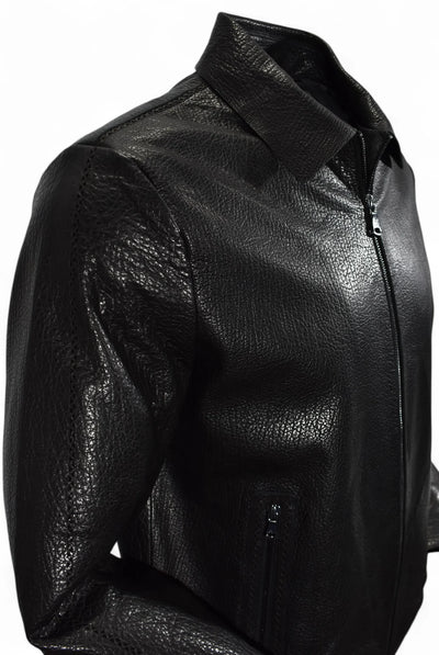 A close-up of the Marcello Redondo Leather Jacket J-233 in black textured nappa leather, featuring a zipper closure, side pockets, and a bold laser cut geometric pattern, displayed on a white background.