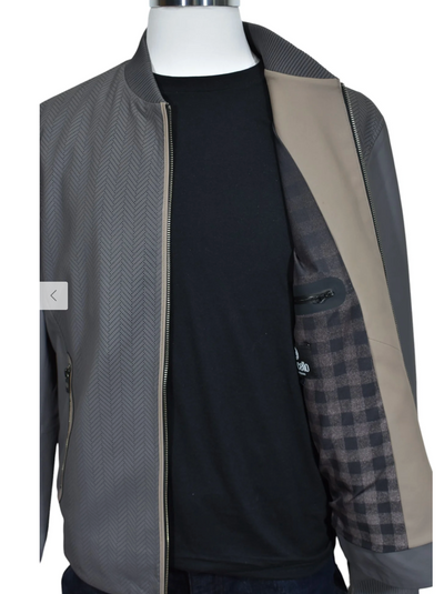 A mannequin wears the unzipped Marcello Chevron Leather Jacket J-228 over a black shirt, revealing its checked lining and interior pocket—showcasing the refined style of Marcello.