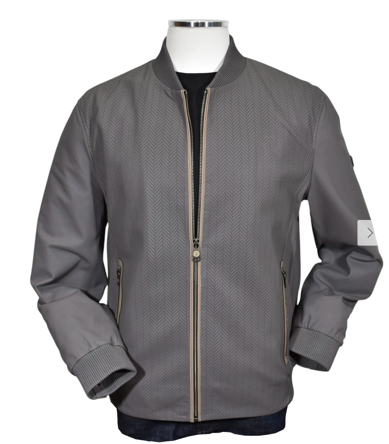 The Marcello Chevron Leather Jacket J-228 features a gray zip-up design with a subtle herringbone pattern, ribbed cuffs, and two zippered side pockets, capturing Italian elegance as showcased on a mannequin.