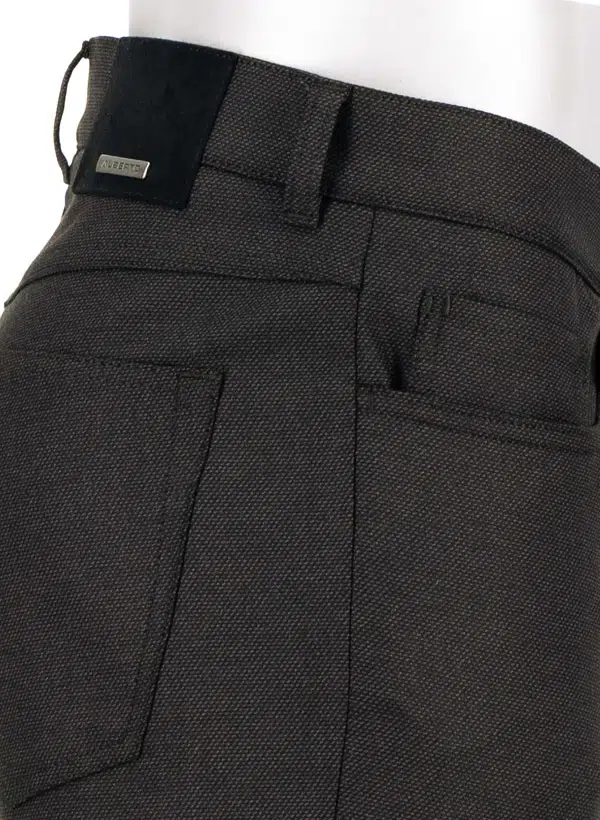 Close-up of the back and side pocket area of the dark gray textured Alberto Pipe Melange Birdseye Pant 1638, highlighting a belt loop, intricate stitching details, and a small metal Alberto brand tag near the waistband—these pants deliver a refined interpretation of classic regular fit trousers.