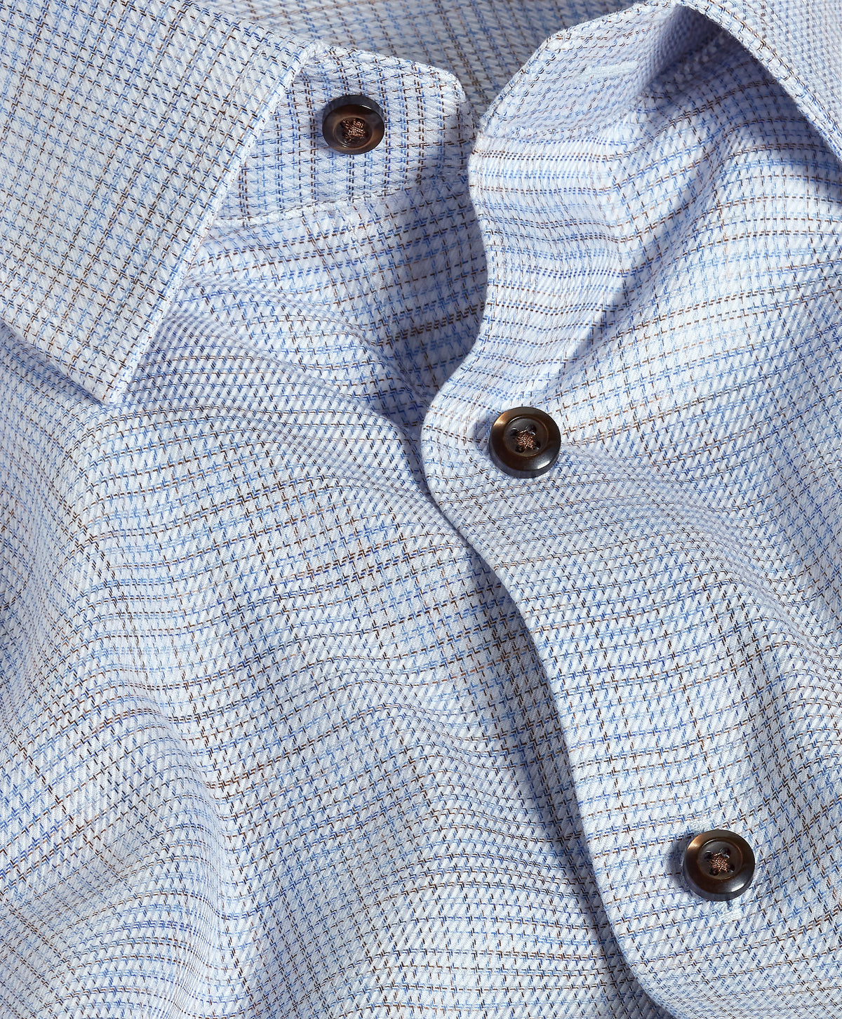 Close-up of the David Donahue Blue & Chocolate Multi Check Dress Shirt TBSP13805 featuring light blue checks and chocolate brown buttons.