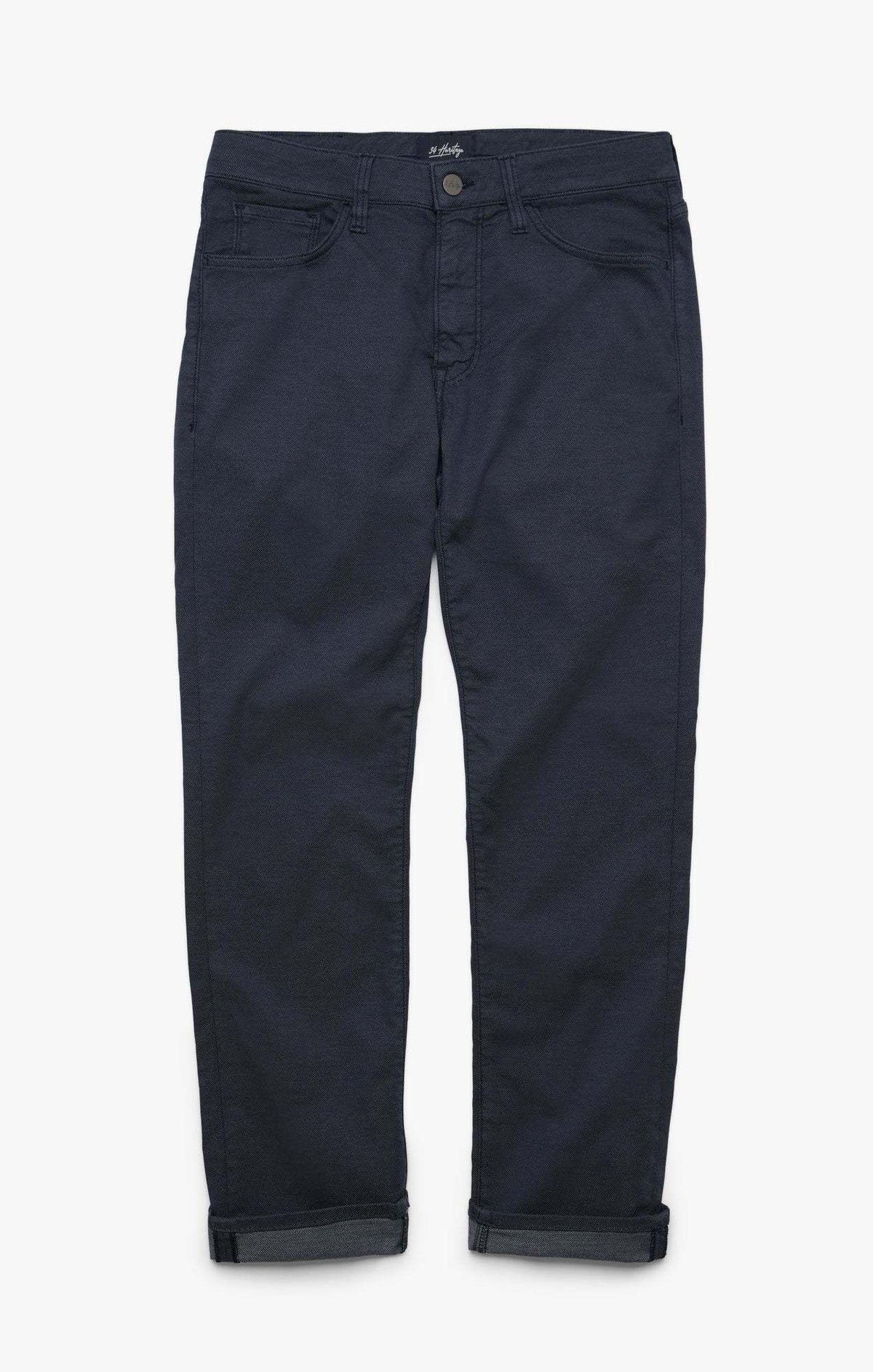 34 Heritage Courage Coolmax dark navy blue modern straight-leg jeans with cuffed hems and five pockets.