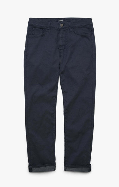 34 Heritage Courage Coolmax dark navy blue modern straight-leg jeans with cuffed hems and five pockets.