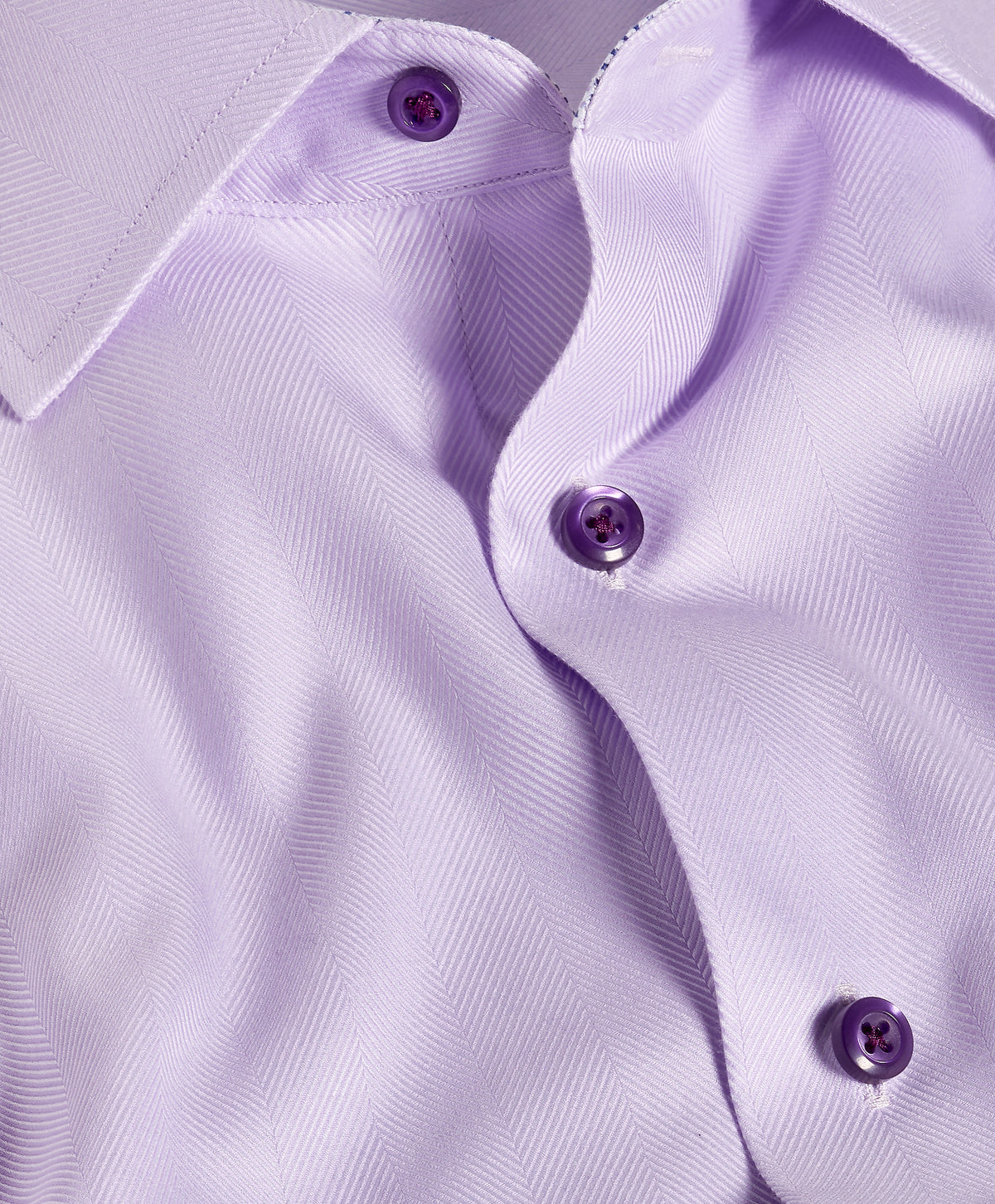 Close-up of the David Donahue Contrast Herringbone Solid Dress Shirt TBMS13100, featuring purple buttons and a modern trim fit with a partially open collar.