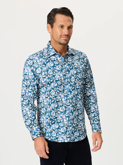 A man wearing the Robert Graham Euclid Long Sleeve Shirt Big & Tall—a blue and white mosaic print button-down by Robert Graham—stands against a plain white background.